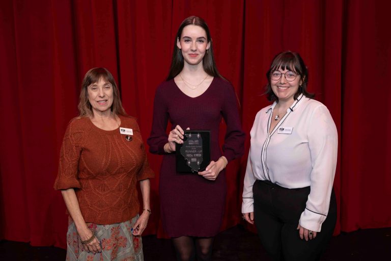 Springfield Area Arts Council Staff posing with the Poetry Out Loud Illinois State Runner-Up